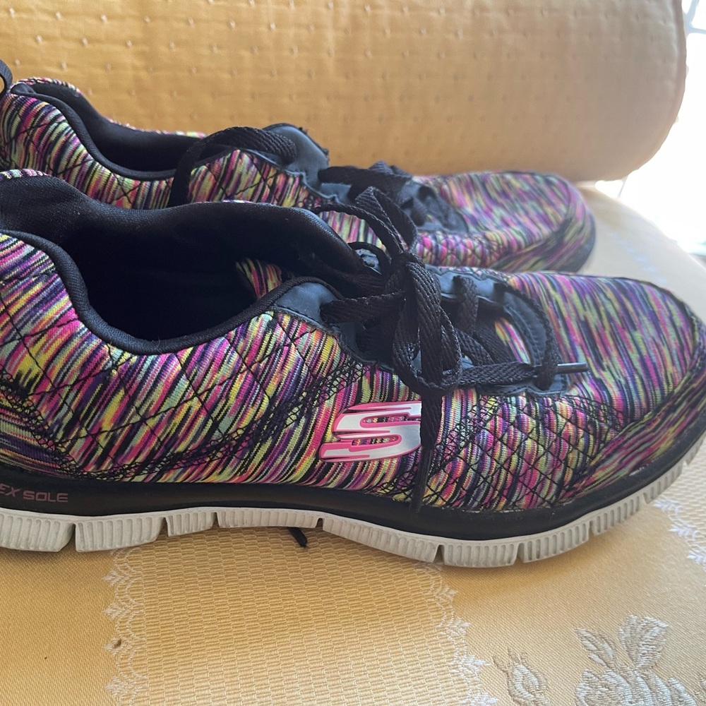 Skechers Pink and Black Sneakers for Casual Comfort